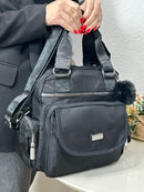 Bolsa Kipling Transversal Bolsos Laterais e Frontal C/ Botão C/ Pompom